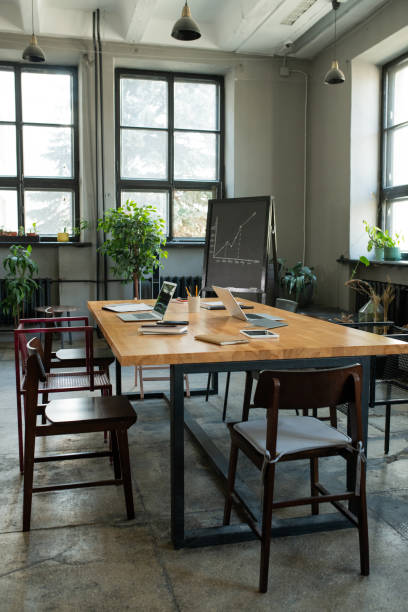 istock Interior of large modern office with table and chairs 1320939915