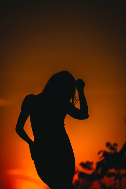 istock Silhouette of a beautiful woman 1320941048
