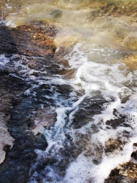 istock Sea waves next to the rocks. 1320941360