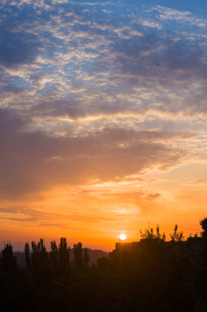 istock Landscape with dramatic light - beautiful golden sunset with saturated sky and clouds. 1320942509