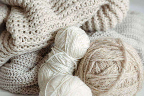 istock Cozy composition with knitted yarn in pastel colors. 1320943413