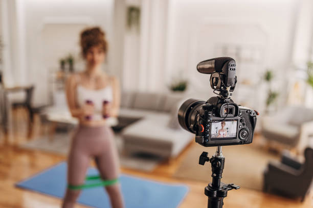 istock Female fitness vlogger exercising 1320944410
