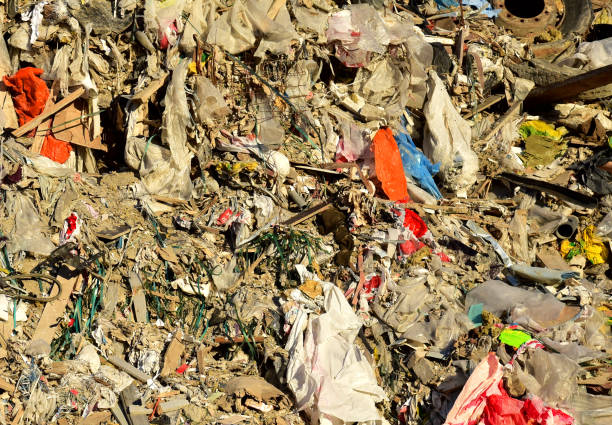 istock Garbage dump with construction waste. Trash disposal and food waste 1320945450