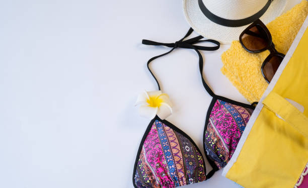 istock Flat lay with beach accessories on white paper background, place for text. 1320947937