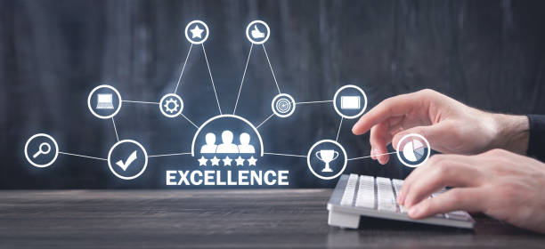 istock Male hands typing in computer keyboard. Excellence. Quality. Business 1320950136
