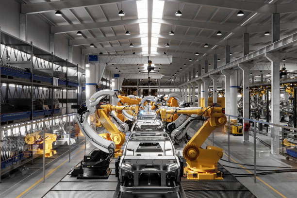 Computer generated image of a vehicle manufacturing company Robotic welding production line in car factory. Computer generated image of a vehicle manufacturing company. automobile industry stock pictures, royalty-free photos & images