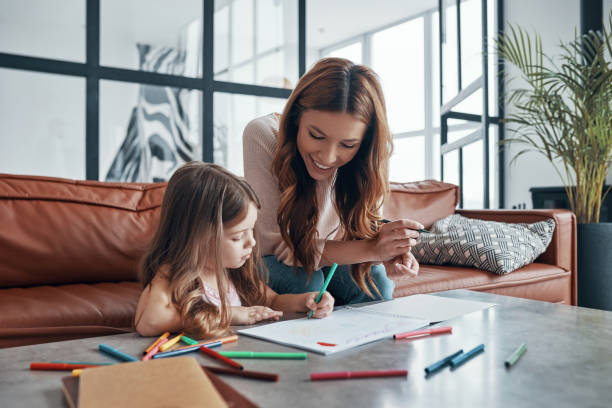 istock Young beautiful mother and her little daughter 1320950708