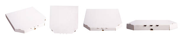 Several empty closed cardboard packages for pizza in different position isolated on white background