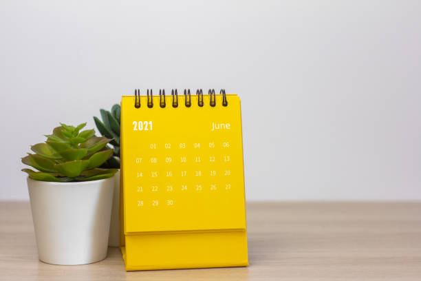istock Flip calendar for June 2021. Desktop calendar for planning, scheduling, assigning, organizing, managing each date 1320953661