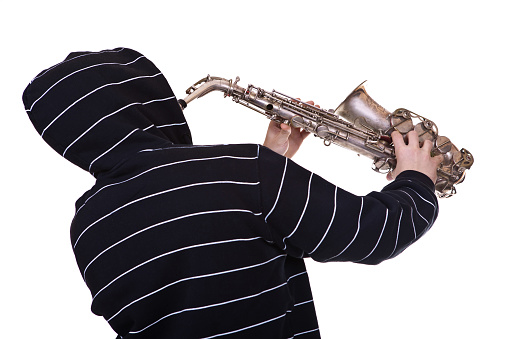 Young man playing saxophone