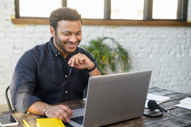 istock Freelancer guy staring at the laptop screen 1320959242