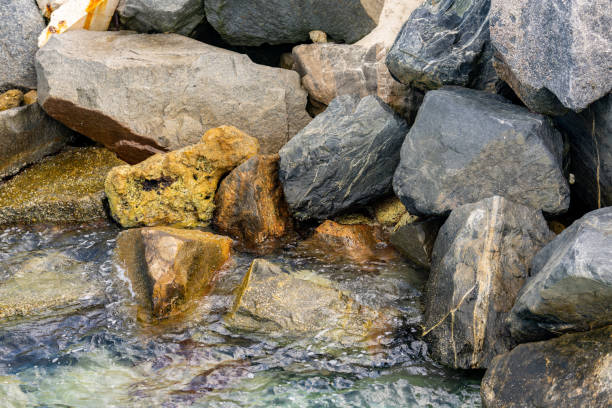 istock Boulders by the water nature photo 1320960478
