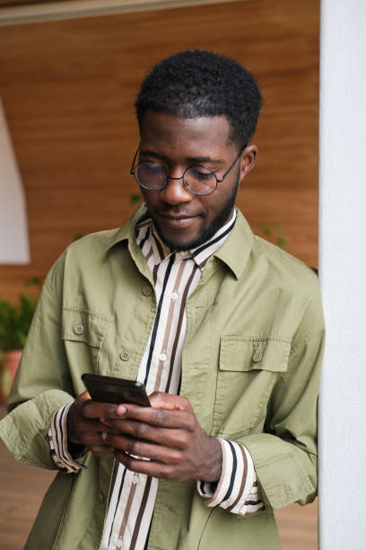 istock Man typing a message on the phone 1320962160