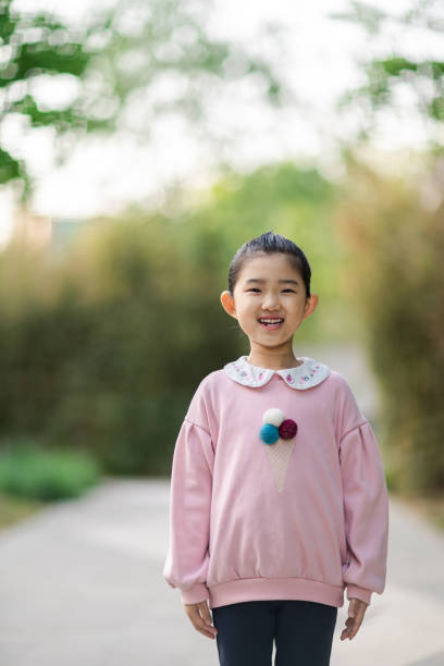 istock Little Girl Making Smiling 1320962851