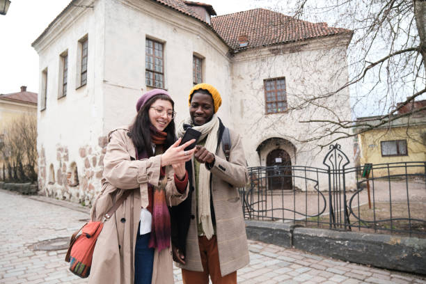 istock Tourists making photos outdoors 1320963030