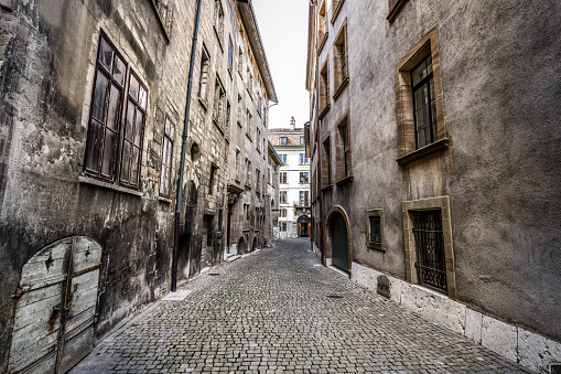 Alleyway Between Buildings Depicting Swiss Architecture In Geneva, Switzerland