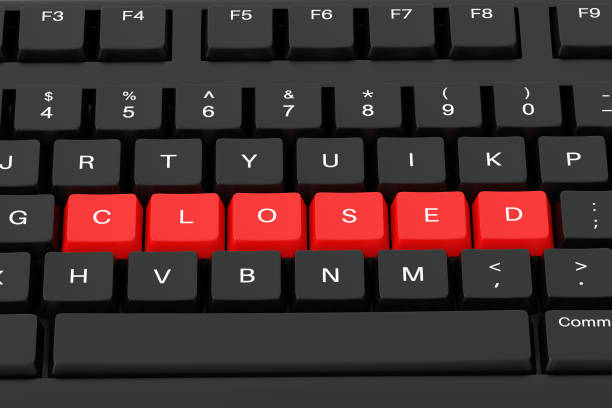istock Closed sign written with red keys on a black keyboard. 3d render illustration 1320970665