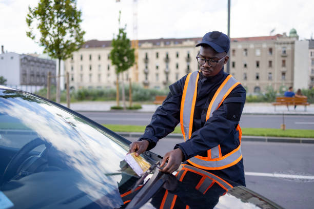 istock Young and committed African American public worker working as a parking supervisor 1320970816