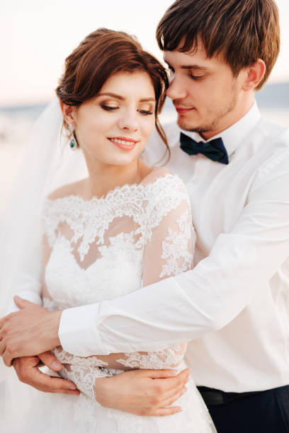 istock Young Couple Holding Hands 1320971157