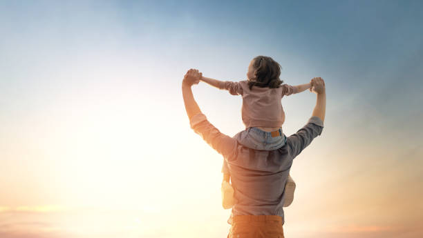 Father and his daughter outdoors Happy loving family. Father and his daughter child playing and hugging outdoors. Cute little girl and daddy fathers day stock pictures, royalty-free photos & images