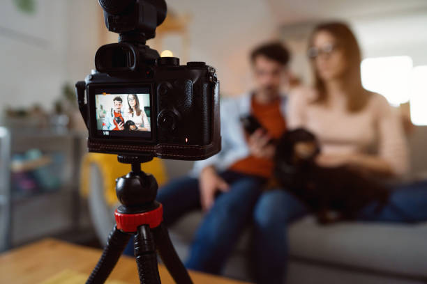 istock Camera display with young  couple recording vlog video 1320972444