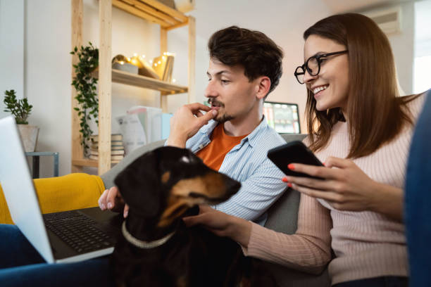 istock Young couple working from home together 1320972464