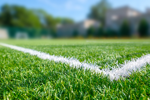 Sports ground, field with artificial turf for playing soccer and other ball sport games.