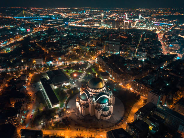 Drone night long exposure of St. Sava temple and rest of Belgrade stock photo