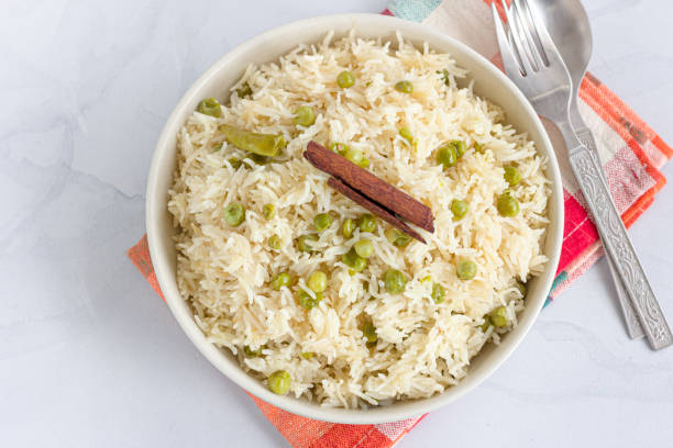 Green Peas Pulao Directly Above Close-Up Indian Food Photography, Green Peas Rice Top Down Photo pilau rice stock pictures, royalty-free photos & images