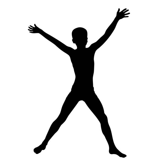 istock Boy jumps with his arms and legs apart, black silhouette 1320979465