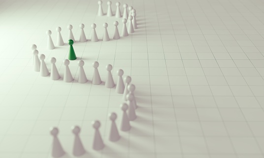 Green pawn of chess, standing out from the crowd of whites, can be used leadership, individuality concepts. ( 3d render )