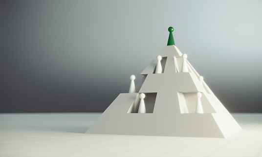 Green pawn of chess, on the top of the pyramid, standing out from the crowd of whites, can be used leadership, hierarchy concepts. ( 3d render )