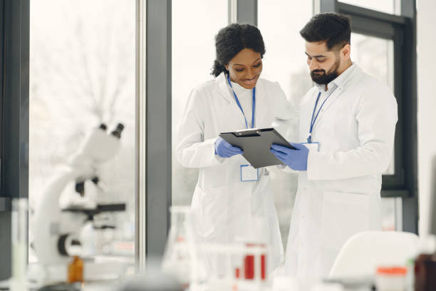 istock Researchers creating vaccine for covid-19 in a lab 1320986907