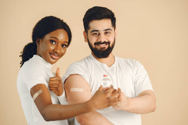 istock People showing thumbs up after getting covid-19 vaccine 1320986982