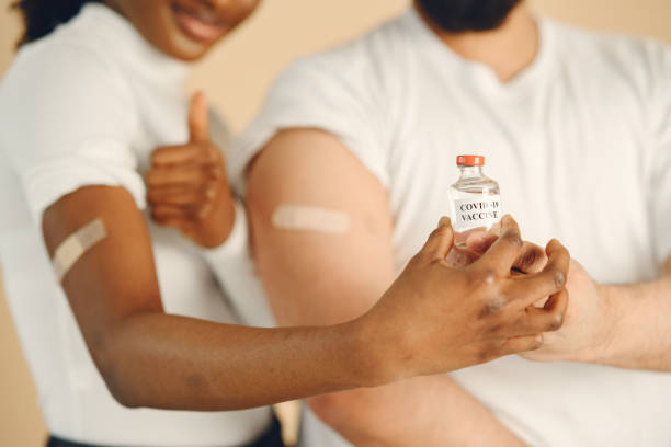 istock People showing thumbs up after getting covid-19 vaccine 1320986984