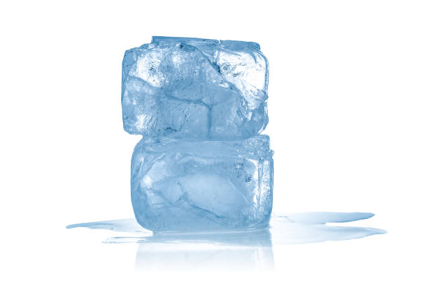 istock Two ice cubes close up isolated on white background 1320988960