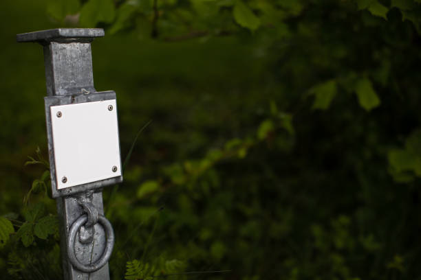 istock metal post with blank white sign 1320990328