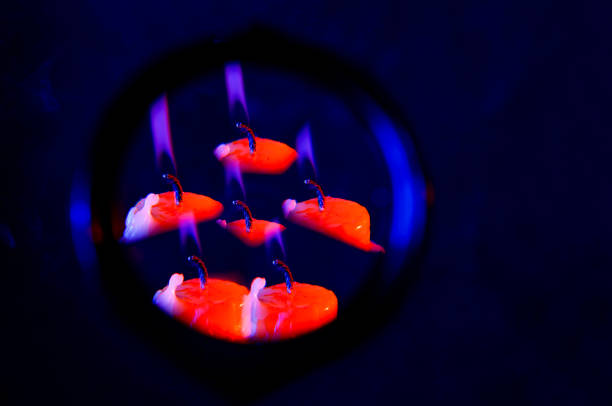 This is a candle with smoke and flame as a background with structure and copy space Photographed in the studio