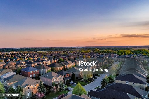 istock Aerial view of Residential Distratic at Major MacKenzie Dr. and Islinton Ave., detached and duplex house at Woodbridge and Kleinburg, Vaughan, Canada 1320991884
