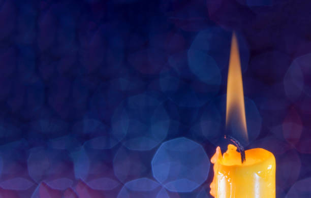 istock Candle with smoke and flame as a background with structure and copy space Photographed in the studio 1320992044