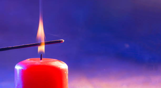 istock Candle with smoke and flame as a background with structure and copy space Photographed in the studio 1320992812