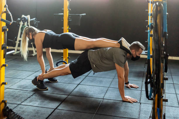 istock Couple at the gym 1320993143