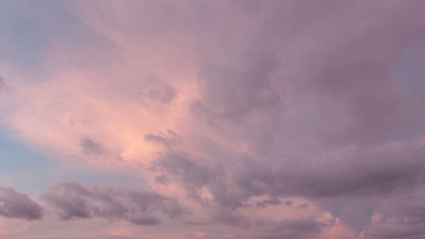 istock sunset with colorful cloudy sky in twilight time,fluffy cloud before rain 1320994686