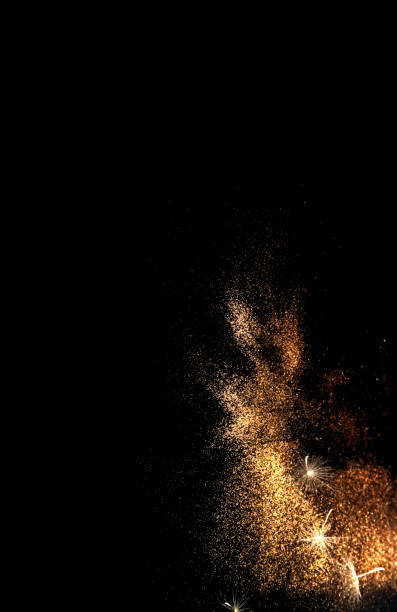 istock Abstract dark background with gold sparkles and white inflorescences Dandelion. Festive background for project. Creative copy space 1320999219