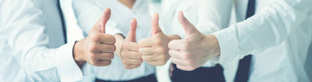istock The happy business people thumb up 1321000919