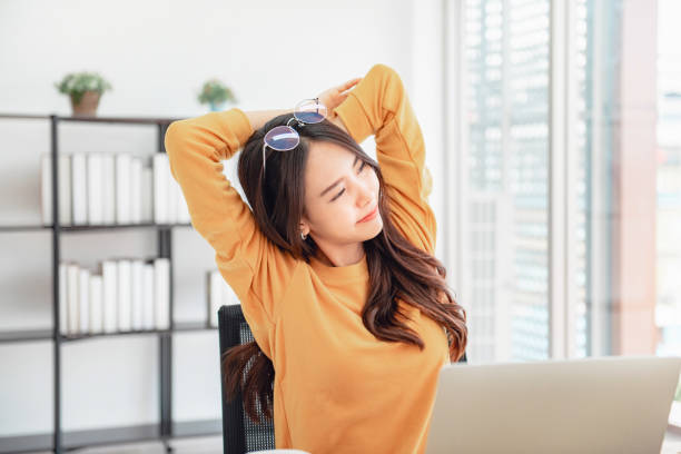 Happy relaxed young woman sitting after using laptop. Happy relaxed young woman sitting after using laptop. pool break stock pictures, royalty-free photos & images