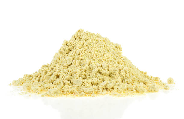 istock Pile of ginger powder isolated on a white background 1321006478