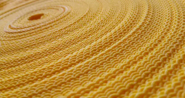 Photo of Beautiful yellow abstract background. Circular pattern of yellow sling