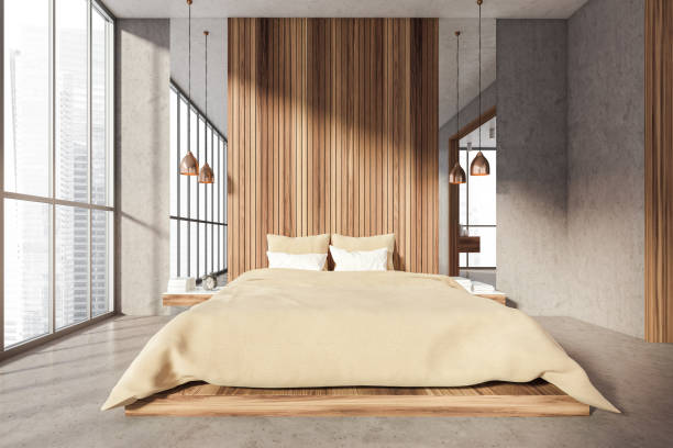 istock Grey and wooden bedroom interior with bed, window and lamps 1321010400