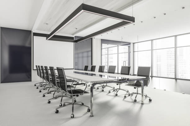 istock Conference room interior with furniture and projection screen, panoramic windows 1321010512